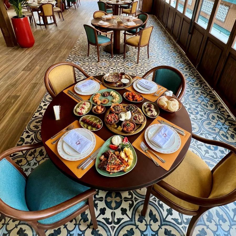 Crowne Plaza - West Cairo Arkan By Ihg 6th of October City Экстерьер фото A table set for a meal
